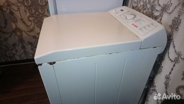 Стиральная машина Asko с верт.загрузкой
