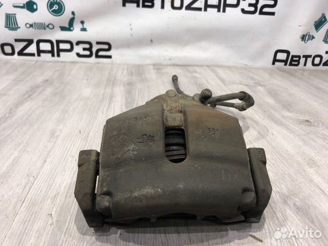 Суппорт тормозной передний правый Volkswagen Polo