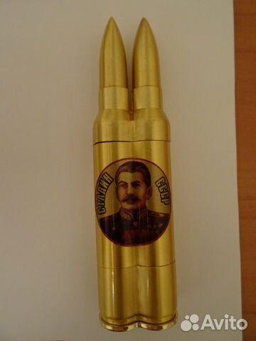 Зажигалка в форме патронов с портретом Сталина