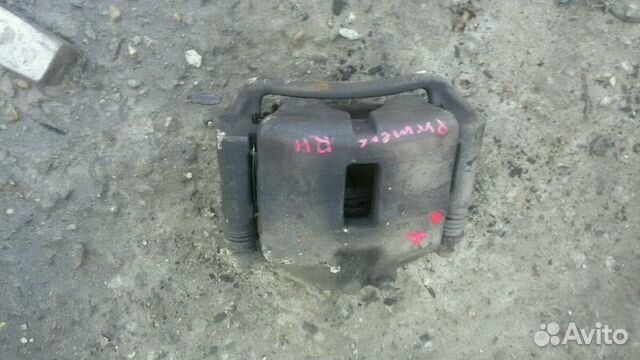 Суппорт передний правый на Ниссан Примера Р12