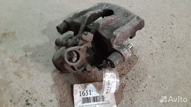 Суппорт тормозной задний левый задний левый Ford