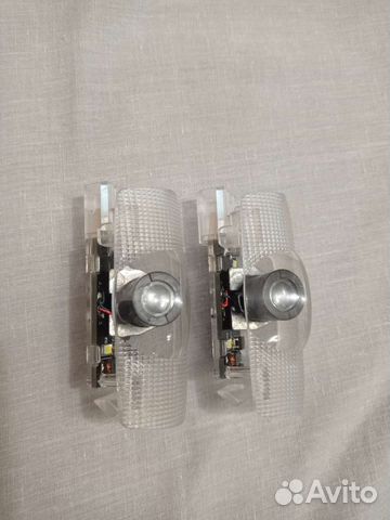 Подсветка в дверь тойота камри