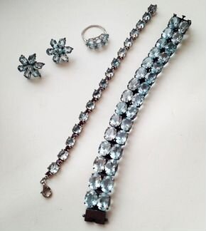 Серебряный украшения с голубыми топазами